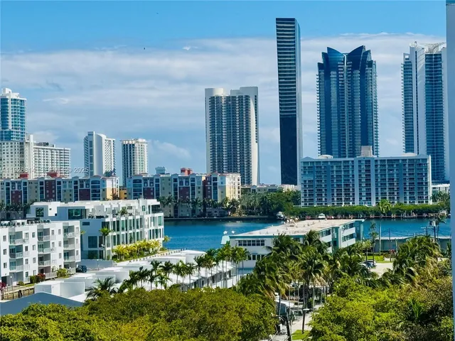 a view of a patio with a table and chairs