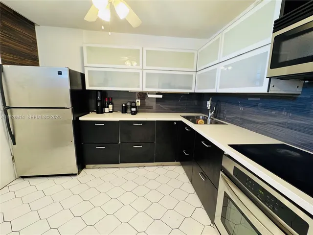 a living room with furniture and a a window