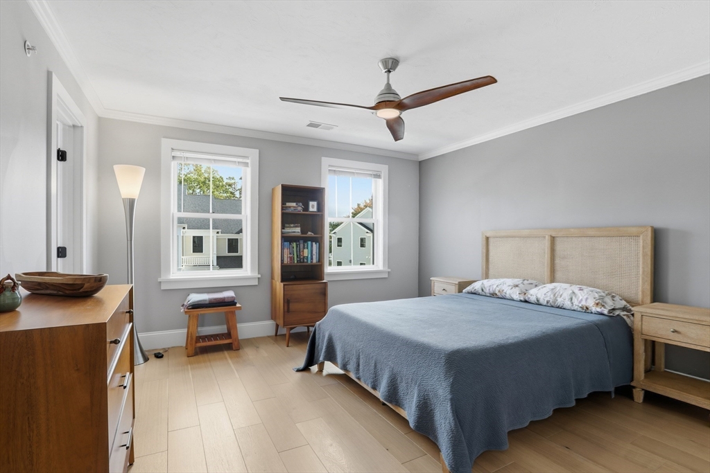 47 Cutter Lane, Unit 47 Amesbury, MA 01913 - Photo 17 of 33 a bedroom with a bed and a table