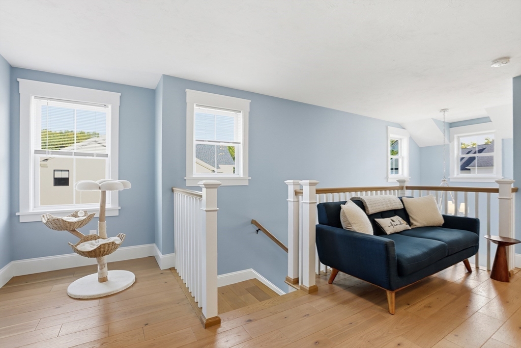 47 Cutter Lane, Unit 47 Amesbury, MA 01913 - Photo 23 of 33 a living room with furniture and a table