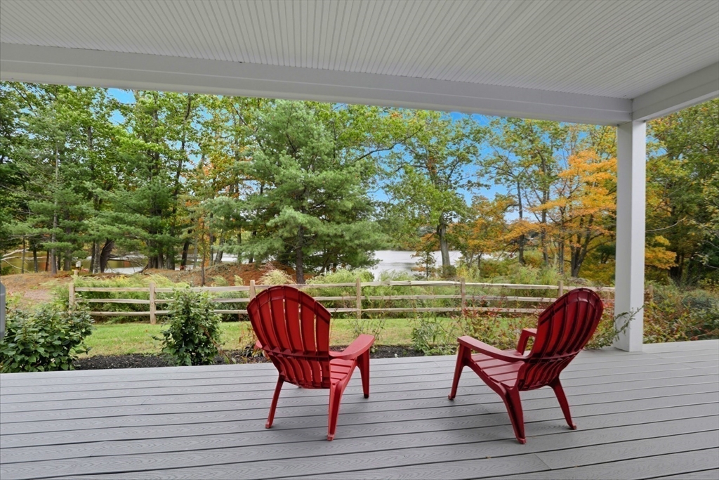 47 Cutter Lane, Unit 47 Amesbury, MA 01913 - Photo 29 of 33 a view of a chairs in backyard of a house