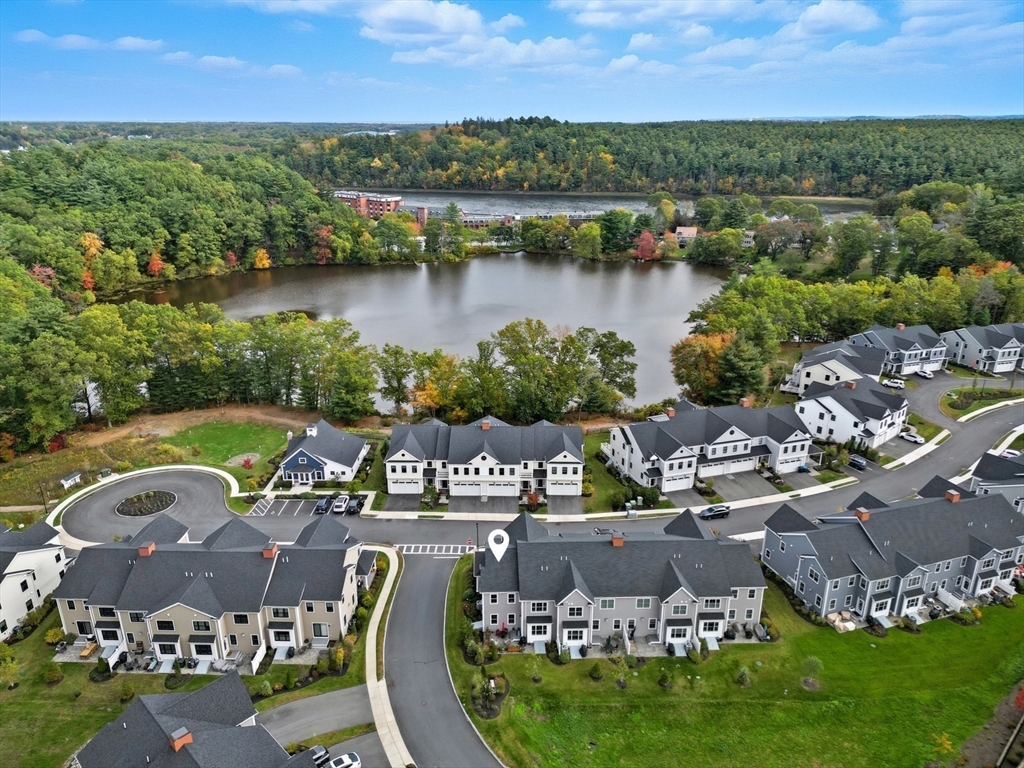47 Cutter Lane, Unit 47 Amesbury, MA 01913 - Photo 32 of 33 an aerial view of a house with outdoor space and lake view