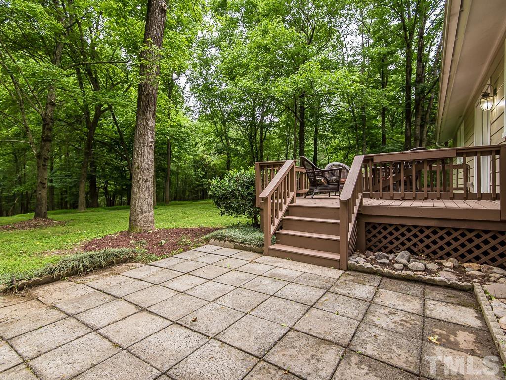 7014 Kemp Road Raleigh, NC 27613 - Photo 36 of 43 a view of a backyard with sitting area