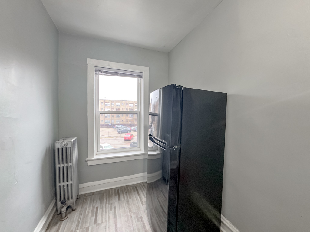 4606 North Beacon Street, Unit 2C Chicago, IL 60640 - Photo 8 of 21 a view of walk in closet with window