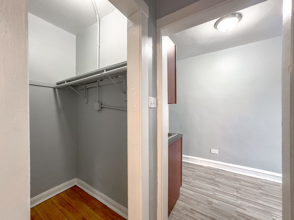 4606 North Beacon Street, Unit 2C Chicago, IL 60640 - Photo 10 of 21 a view of empty room with wooden floor