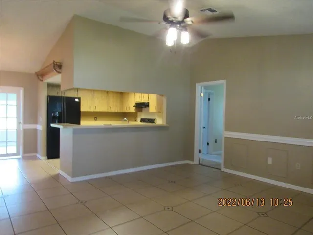 a view of a kitchen with a sink