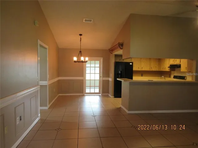 a view of a kitchen with a sink