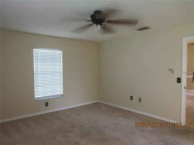 a view of a window in an empty room
