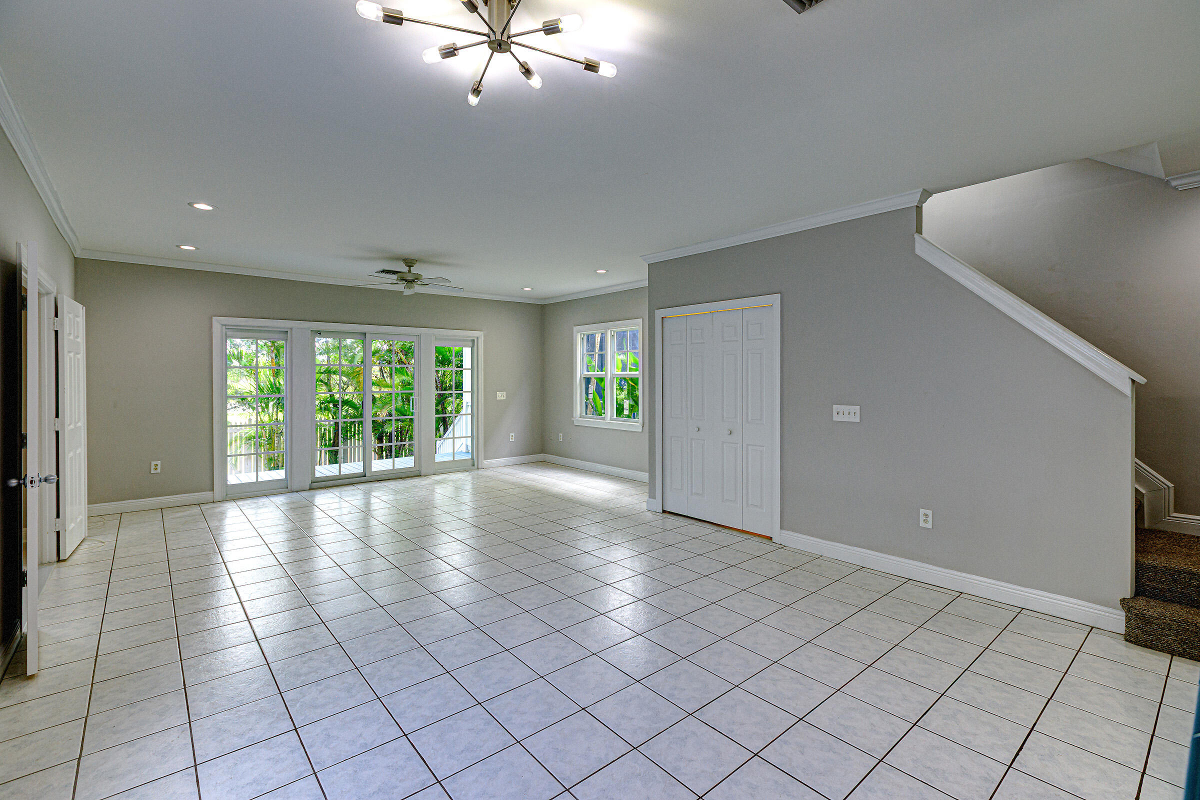249 Golf Club Drive Key West, FL 33040 - Photo 3 of 11 a view of an empty room with a window