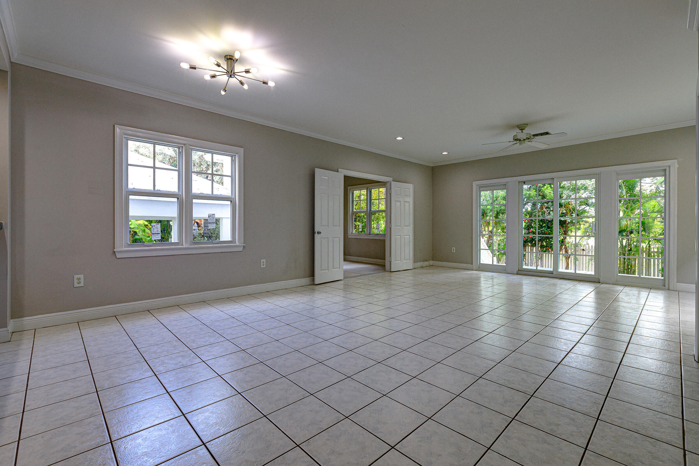249 Golf Club Drive Key West, FL 33040 - Photo 4 of 11 a view of an empty room with a window