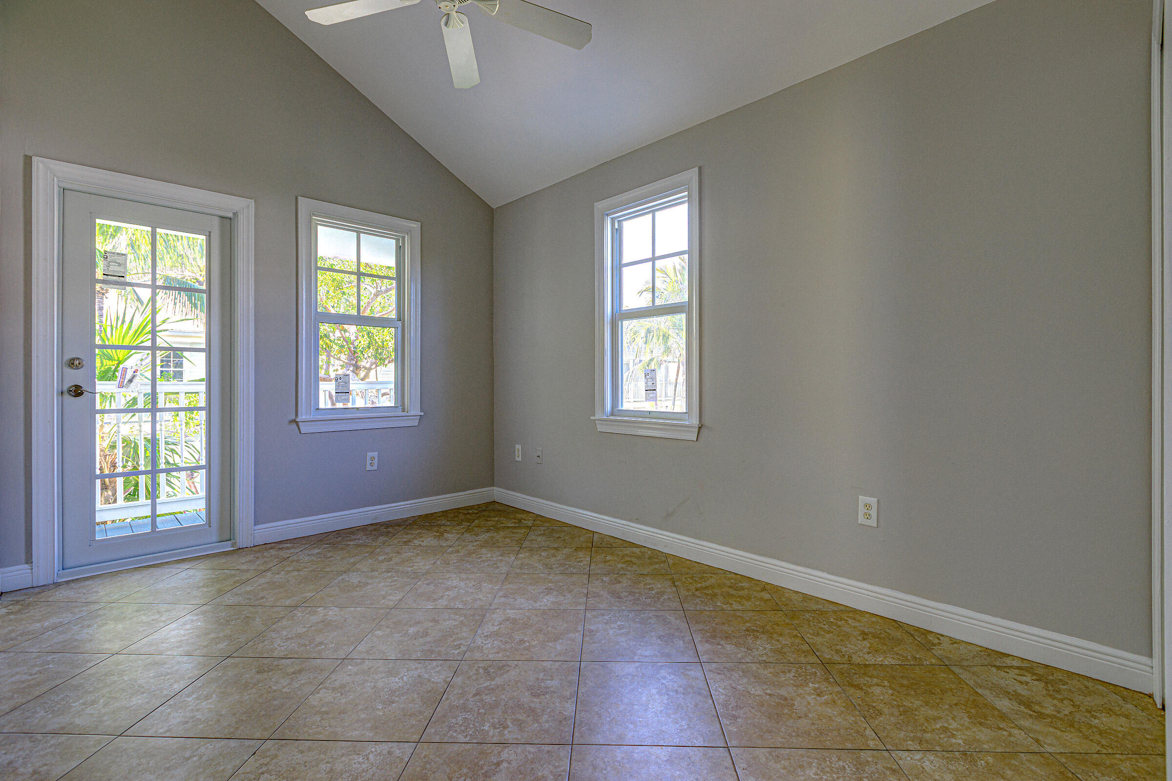 249 Golf Club Drive Key West, FL 33040 - Photo 10 of 11 a view of an empty room with a window