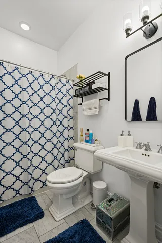 a bathroom with a sink and a toilet