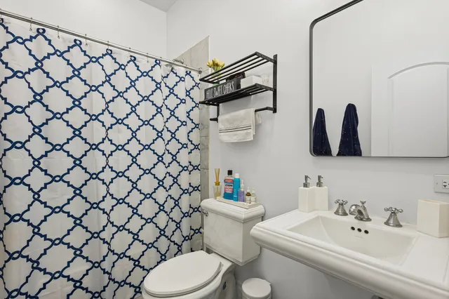 a picture of a bench in a white building