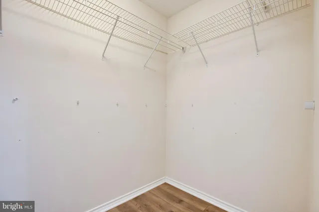 a view of a room with racks on the wall