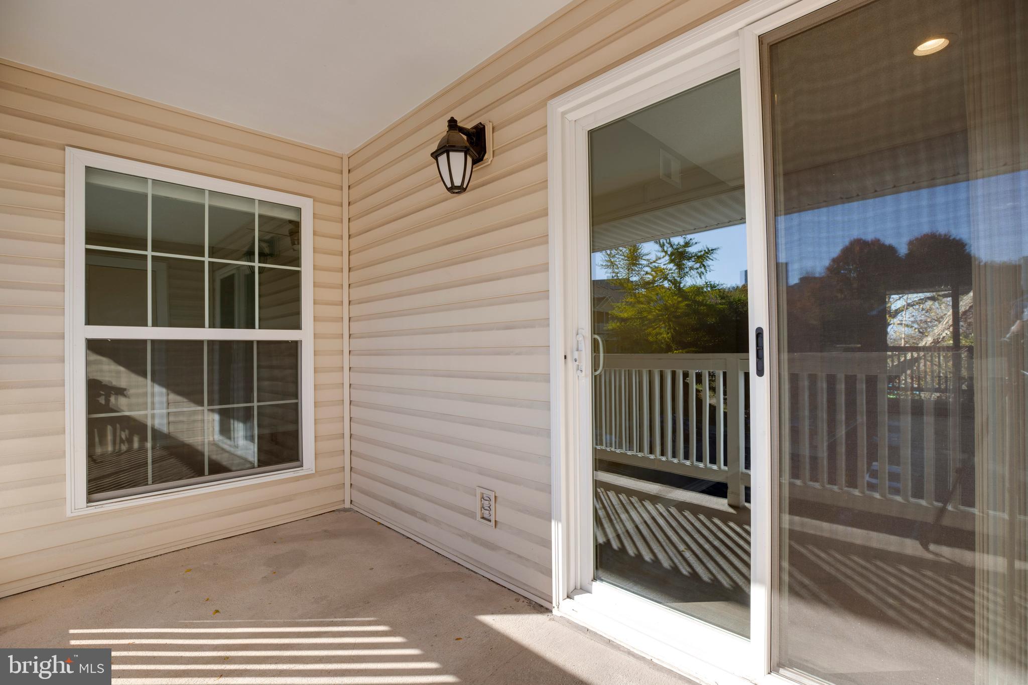 1543 Lincoln Way, Unit 301B McLean, VA 22102 - Photo 27 of 30 a view of a porch with a door