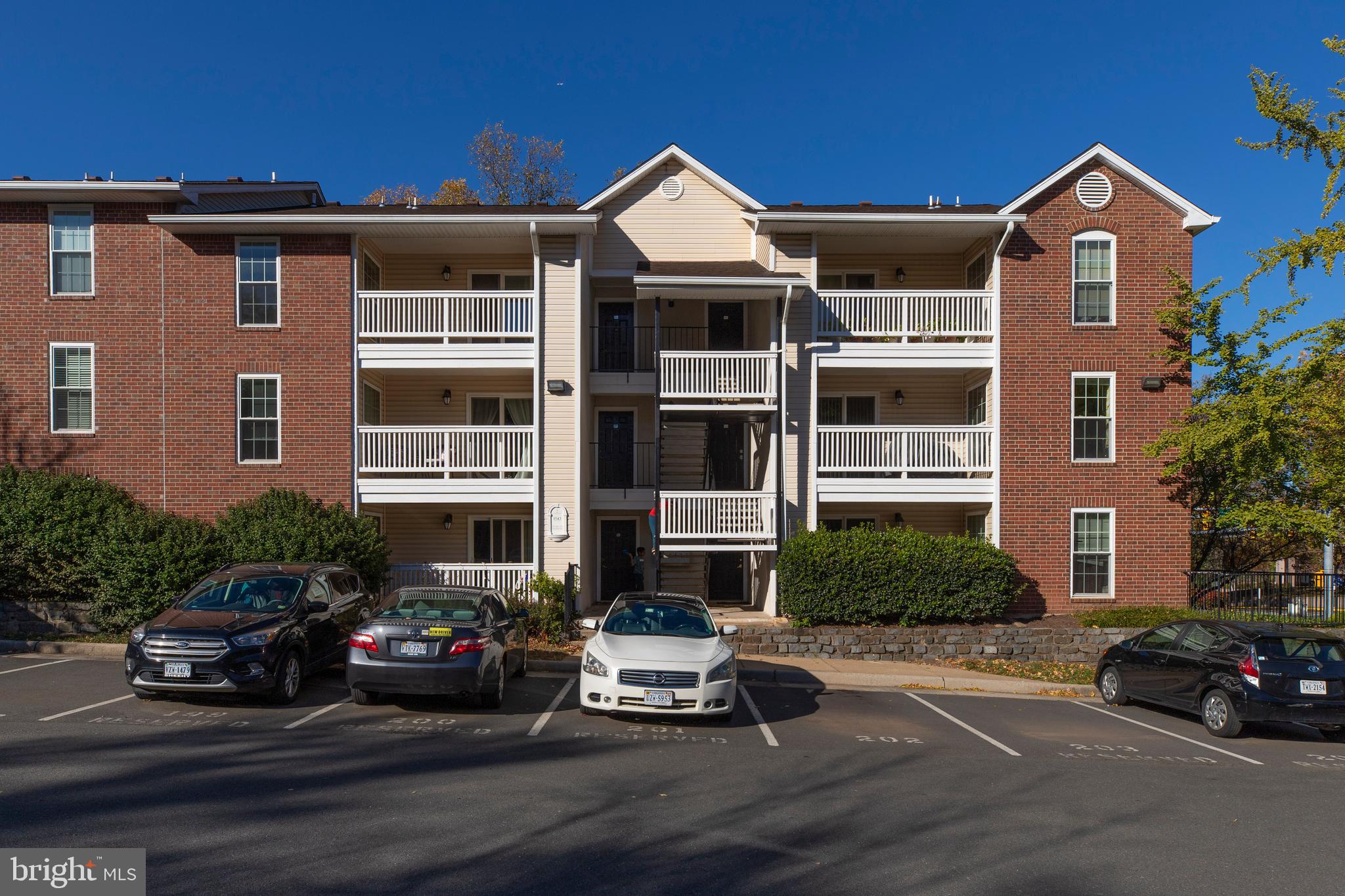 1543 Lincoln Way, Unit 301B McLean, VA 22102 - Photo 28 of 30 a car parked in front of a house