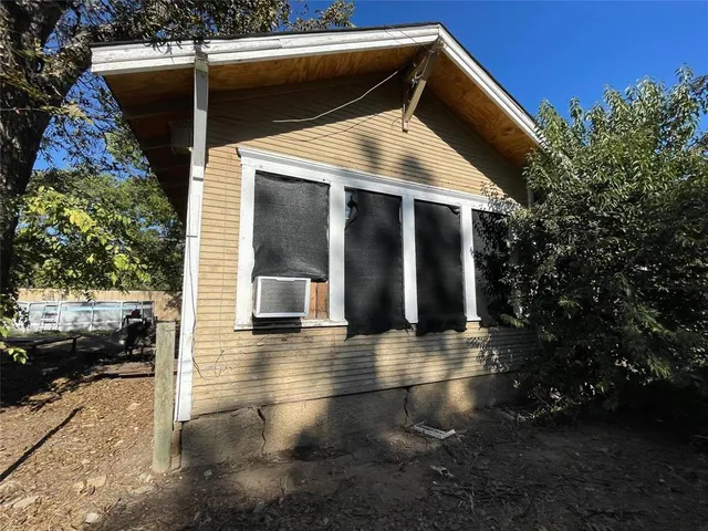 a view of a building with a street