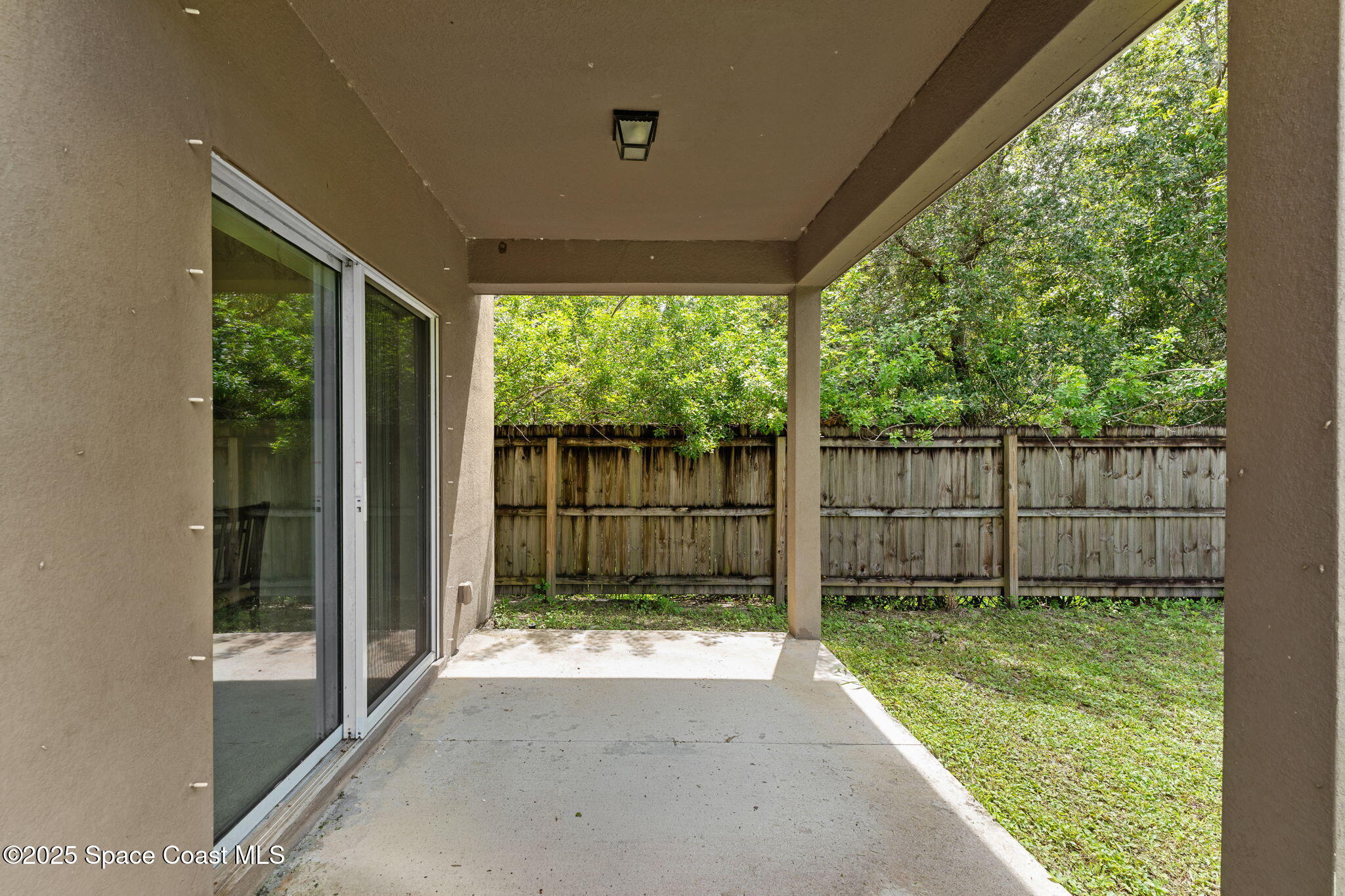 262 Alamere Drive Southwest Palm Bay, FL 32908 - Photo 25 of 34 a view of backyard with green space