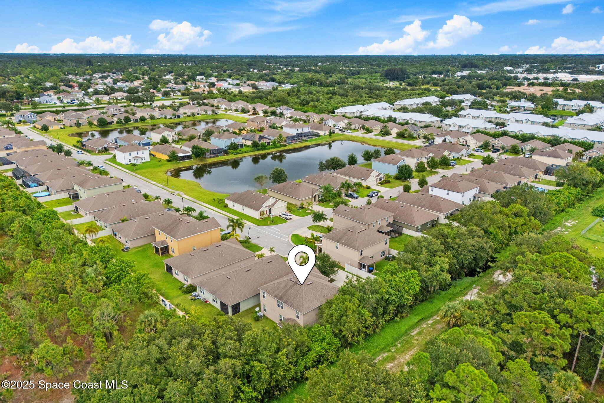 262 Alamere Drive Southwest Palm Bay, FL 32908 - Photo 32 of 34 an aerial view of residential houses with outdoor space and swimming pool