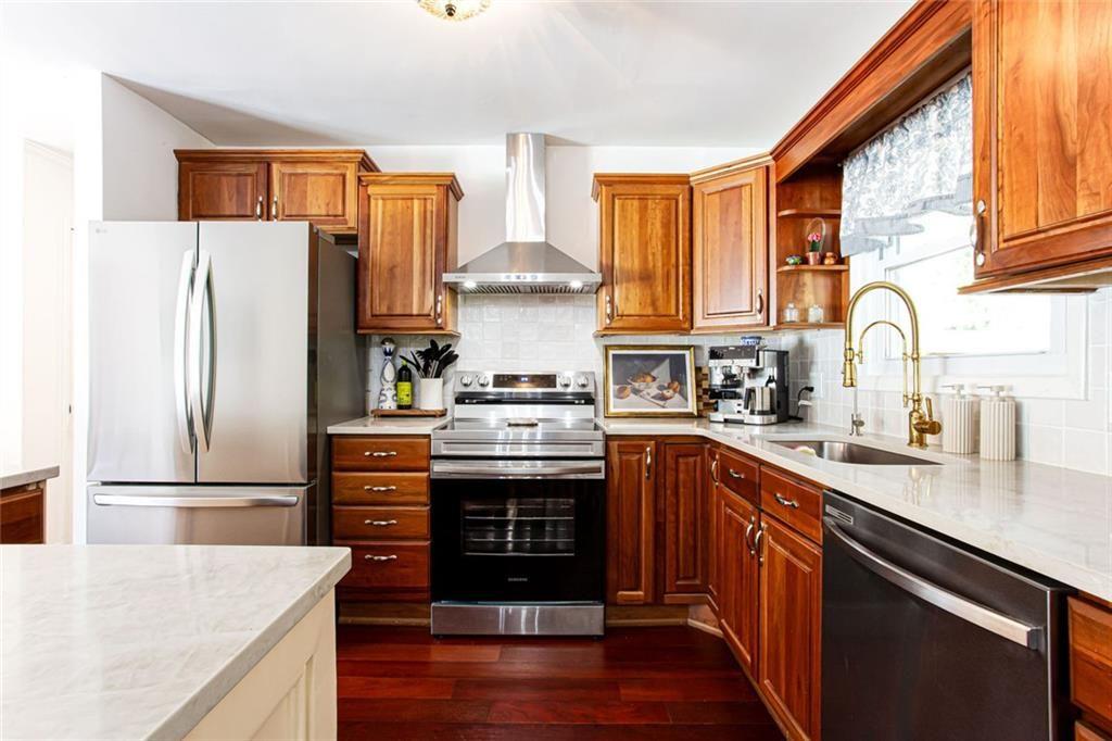 2814 Goodfellows Road Tucker, GA 30084 - Photo 17 of 46 a kitchen with stainless steel appliances granite countertop a refrigerator stove and sink