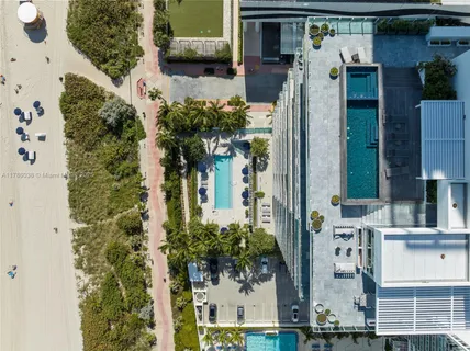 a view of swimming pool with outdoor seating