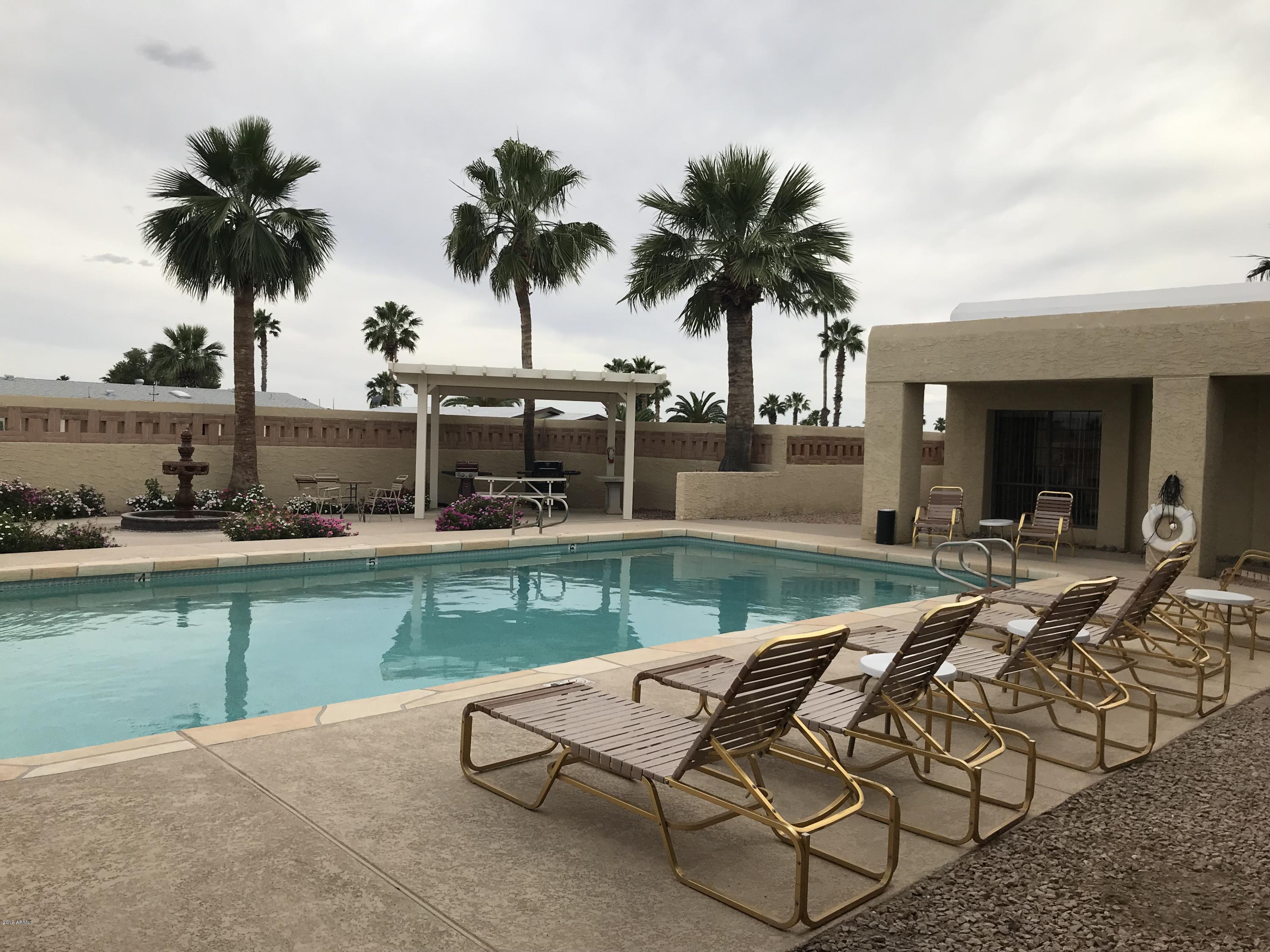 3500 South Tomahawk Road, Unit 204 Apache Junction, AZ 85119 - Photo 39 of 46 Relax by the pool
