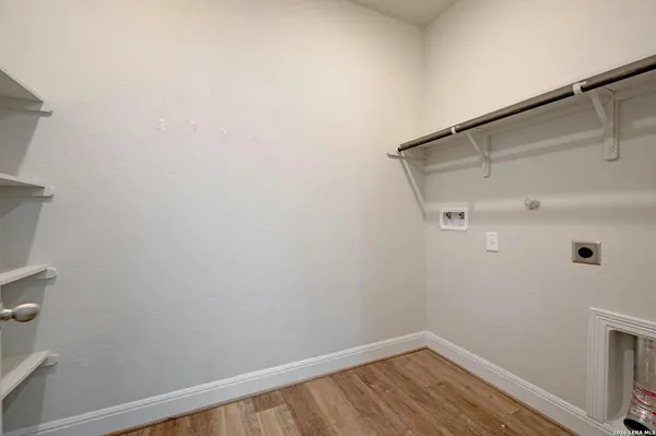 a view of small space with racks on the wall