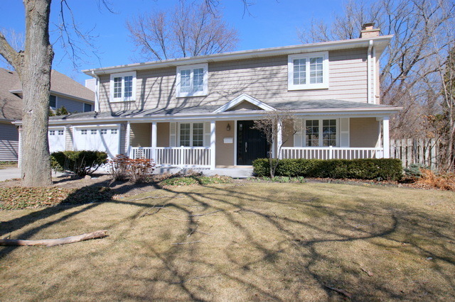 1308 Hackberry Road Deerfield, IL 60015 - Photo 1 of 2 a front view of a house with yard and glass windows