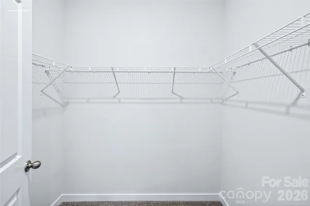 a view of small space with racks on the wall
