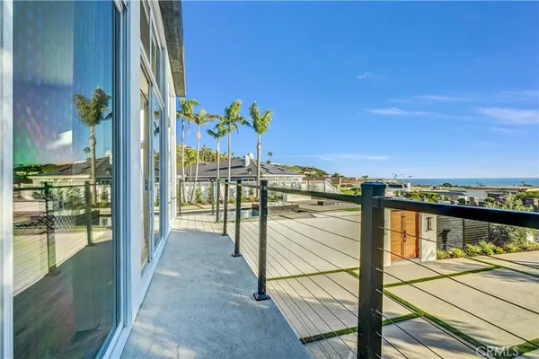 a view of swimming pool with outdoor seating