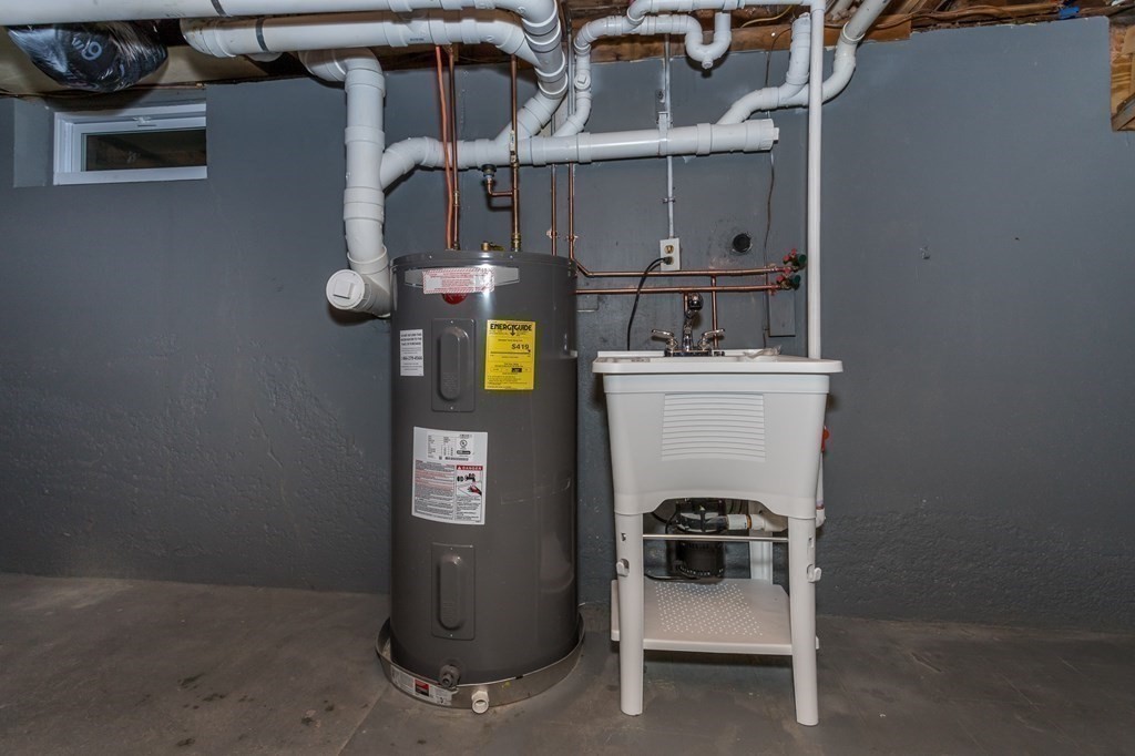 45 Shore Road Ashland, MA 01721 - Photo 19 of 21 a utility room with dryer and washer