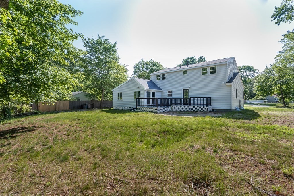 45 Shore Road Ashland, MA 01721 - Photo 21 of 21 a view of a house with backyard and garden