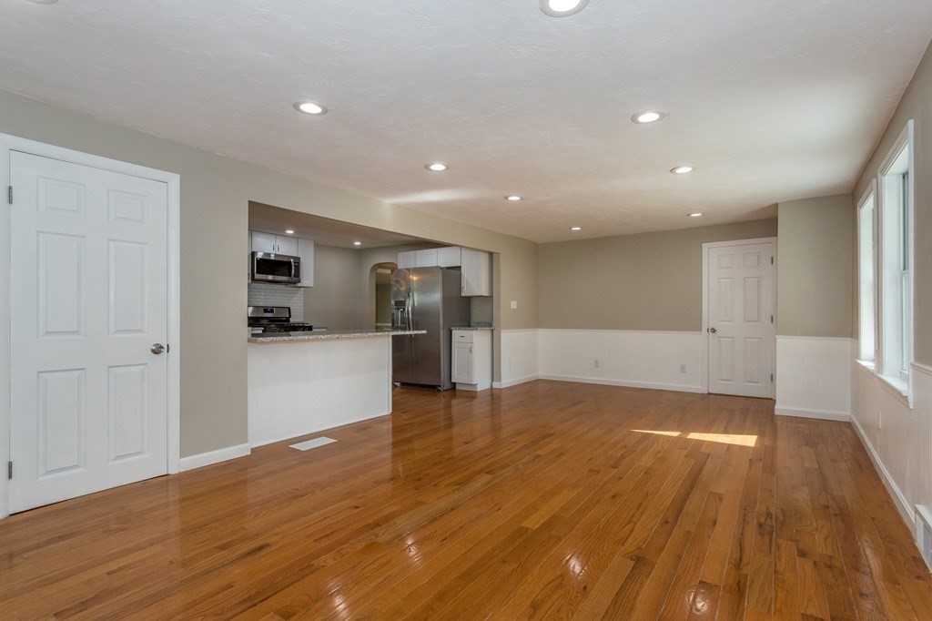 45 Shore Road Ashland, MA 01721 - Photo 6 of 21 a view of empty room with wooden floor