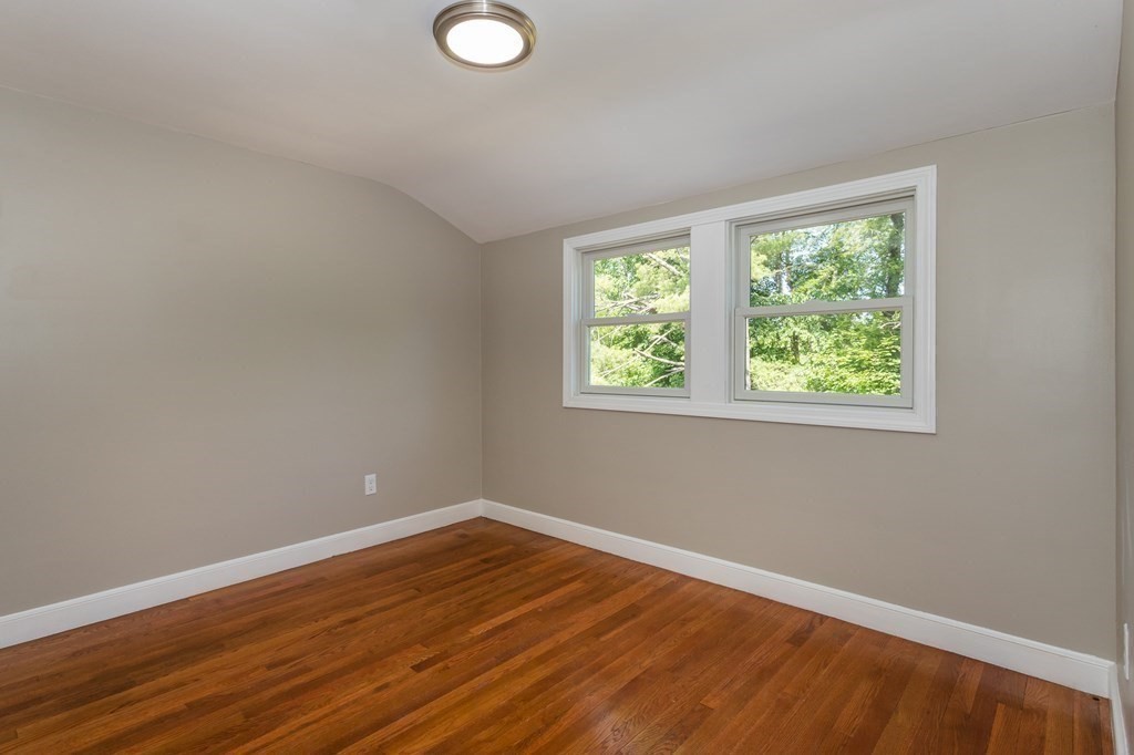 45 Shore Road Ashland, MA 01721 - Photo 10 of 21 a view of a room with wooden floor and windows