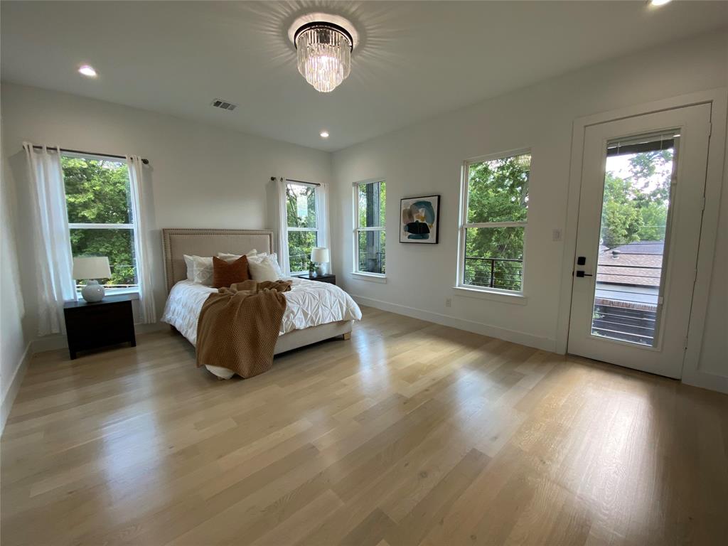 807 South Glasgow Drive Dallas, TX 75223 - Photo 13 of 25 a bedroom with bed and window