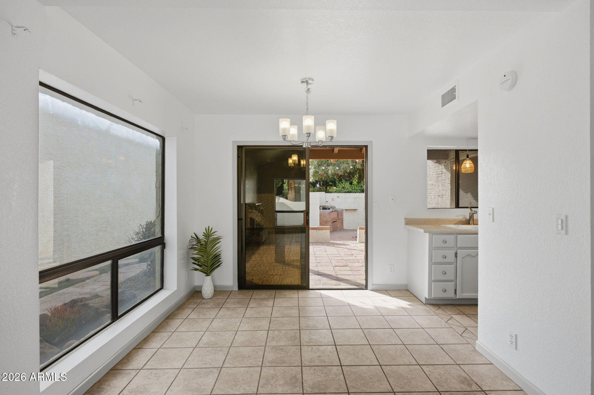1301 West Rio Salado Parkway, Unit 15 Mesa, AZ 85201 - Photo 7 of 22 Dining area open to living room