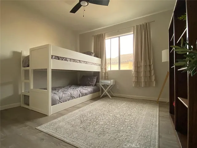 a large bathroom with a double vanity sink and a mirror