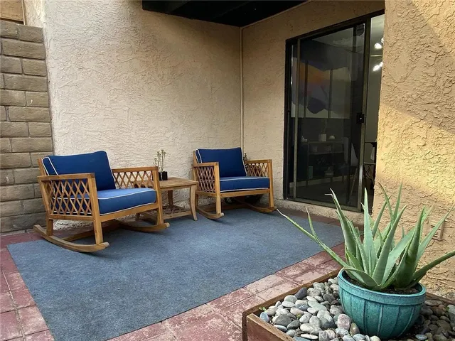 a view of backyard with tub
