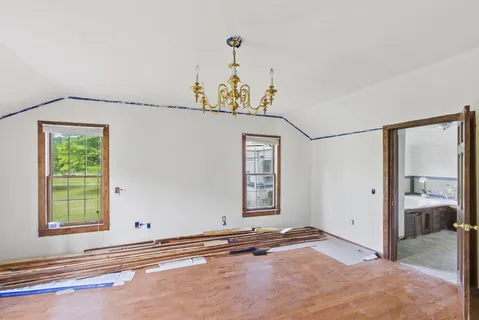 a bathroom with a tub and sink