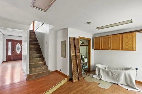 a view of an entryway with a mirror