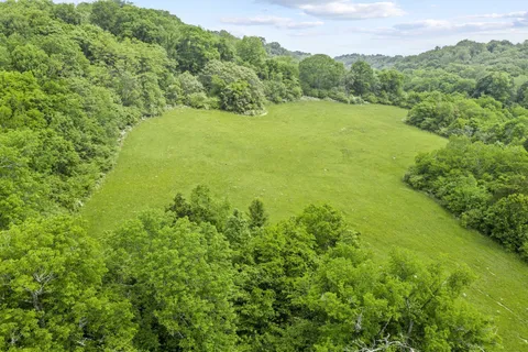 a view of a lake with a yard