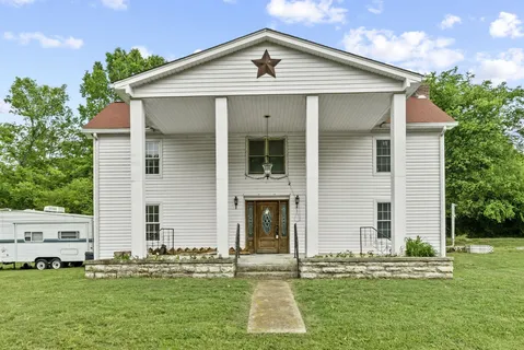a front view of house with yard