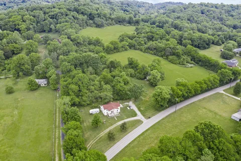 a view of a forest from a balcony