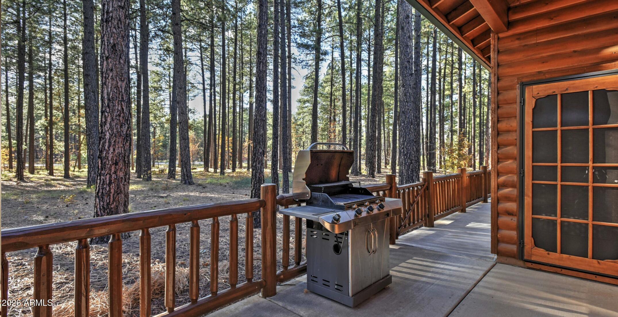 2942 Timber Line Road Pinetop, AZ 85935 - Photo 23 of 27 a view of a balcony with chairs