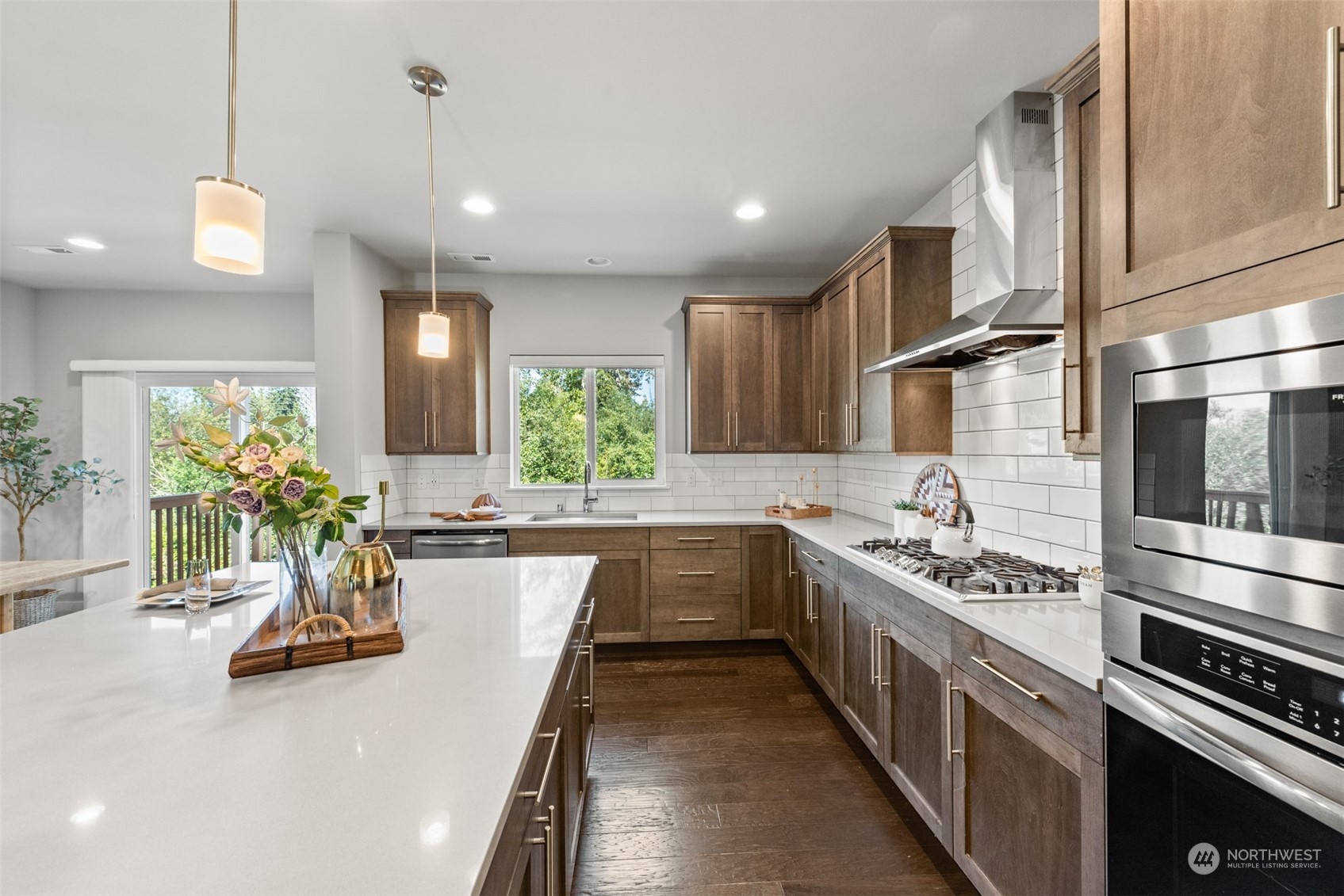 21314 43rd Drive Southeast Bothell, WA 98021 - Photo 11 of 38 a kitchen with lots of counter top space and stainless steel appliances