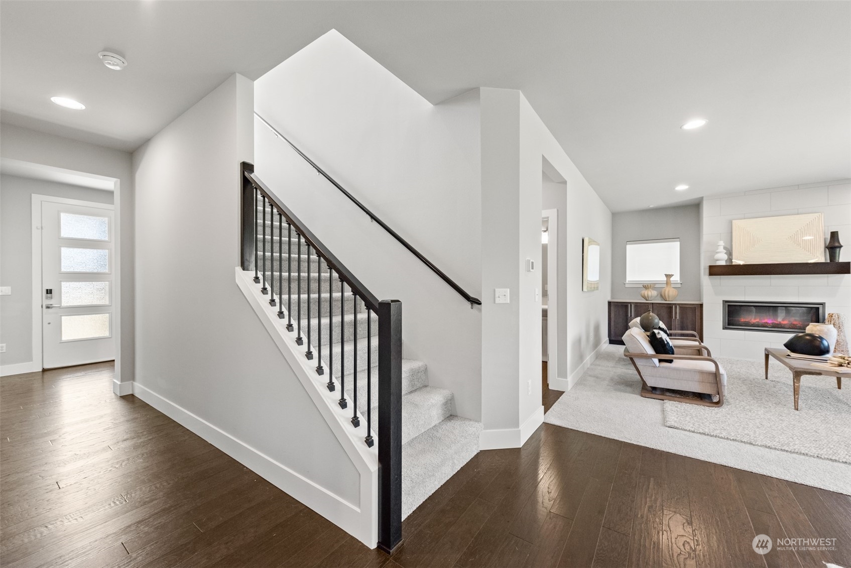 21314 43rd Drive Southeast Bothell, WA 98021 - Photo 13 of 38 a view of front door with hallway and wooden floor