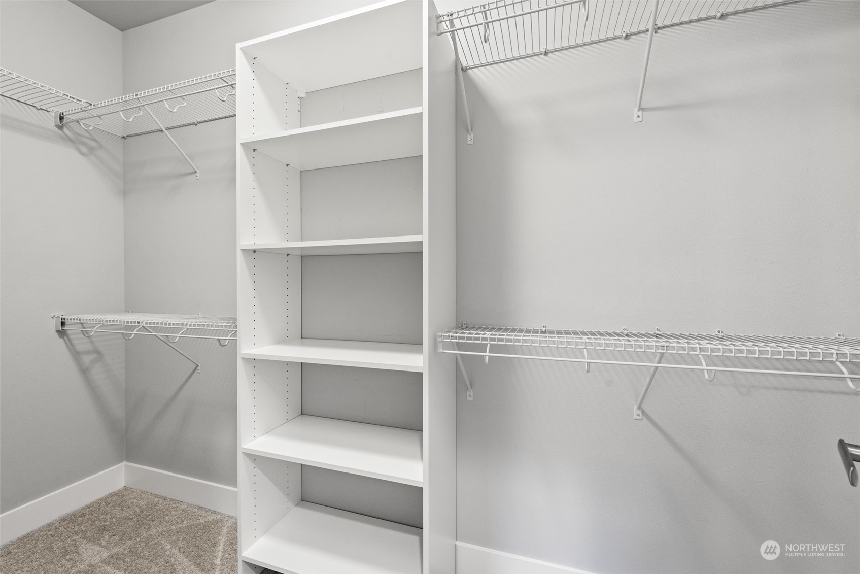 21314 43rd Drive Southeast Bothell, WA 98021 - Photo 16 of 38 a view of walk in closet with empty racks