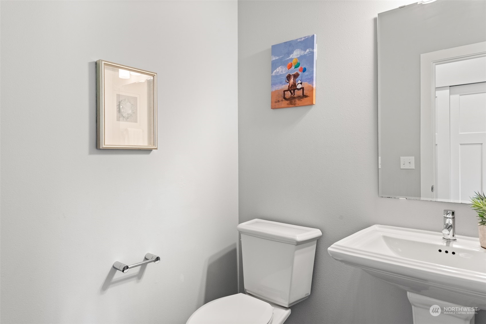 21314 43rd Drive Southeast Bothell, WA 98021 - Photo 17 of 38 a bathroom with a toilet a sink and mirror