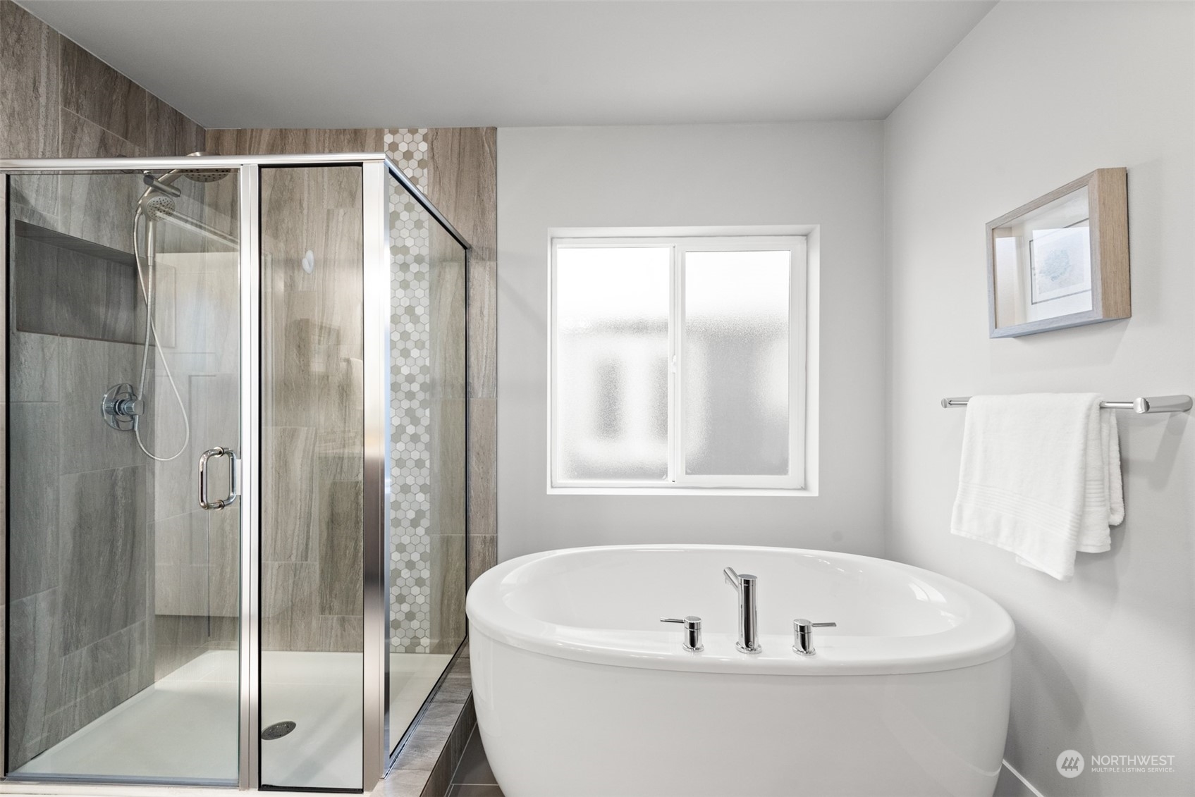 21314 43rd Drive Southeast Bothell, WA 98021 - Photo 23 of 38 a white bath tub sitting next to a shower