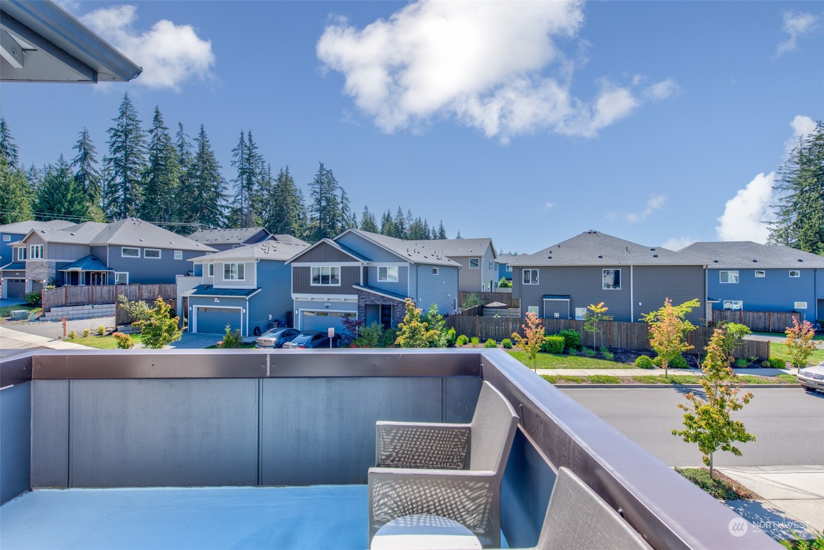 21314 43rd Drive Southeast Bothell, WA 98021 - Photo 30 of 38 a front view of a house with yard and parking
